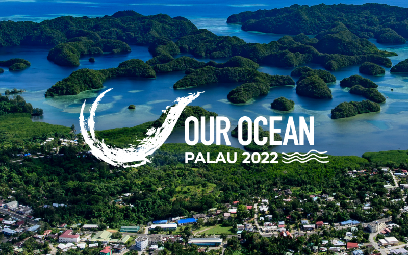 Aerial photograph of Koror City, Palau with Our Ocean Palau 2022 logo.