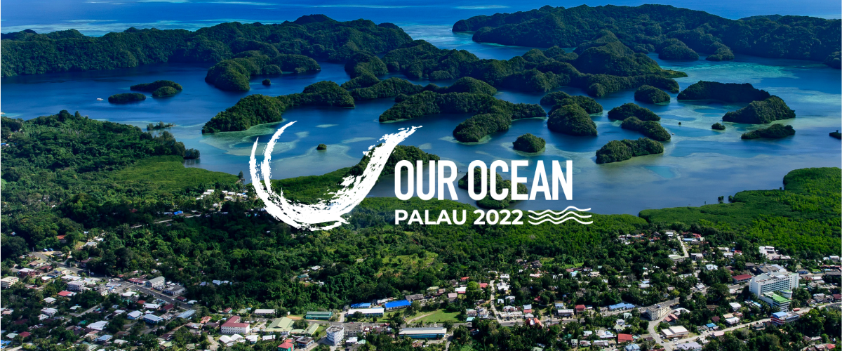 Aerial photograph of Koror City, Palau with Our Ocean Palau 2022 logo.